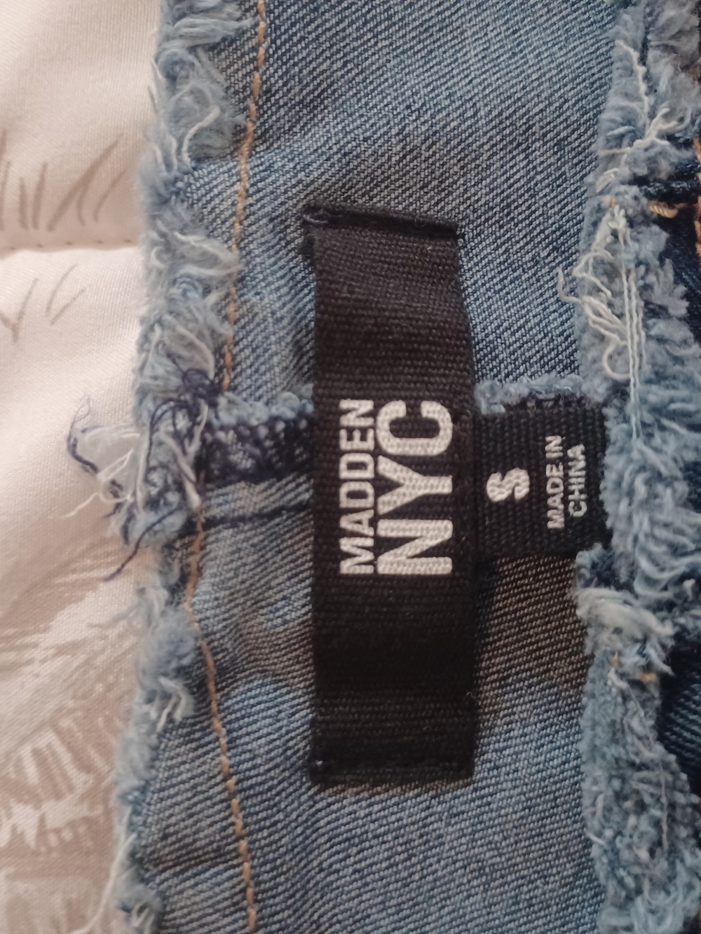 Madden NYC Women's Light Blue Distressed Denim Shorts